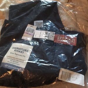 Brand new black khaki pants. 32 x 34. Dockers.